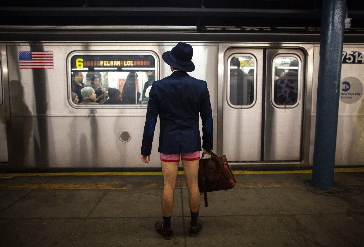 a-man-takes-part-in-the-annual-no-pants-subway-ride-in-new-york-on-jan-12-2014